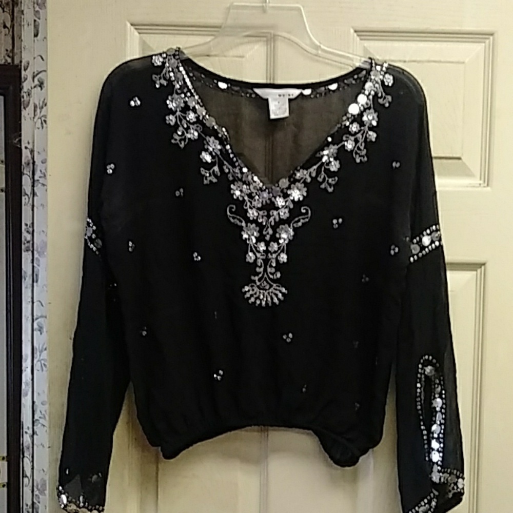 WD.NY 100 percent silk and 100 percent polyester
